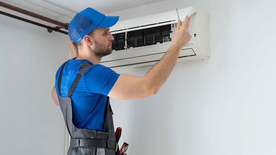 Technician performing annual ac tune up 