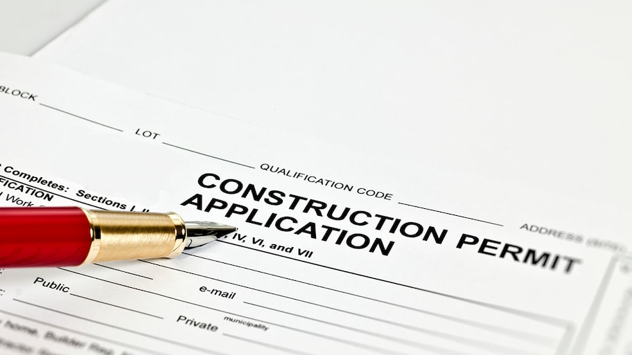 construction permit application being filled out