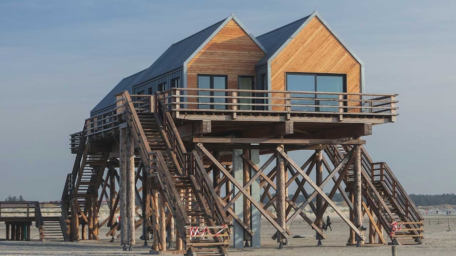 A house on wooden stilts on a beach