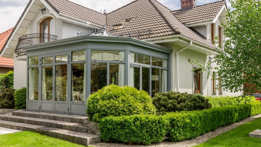 A modern house with glazed arbor