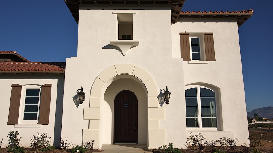 modern home with stucco siding façade