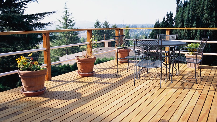 new deck on upper level of house overlooking trees