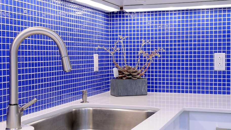 kitchen with new tile backsplash