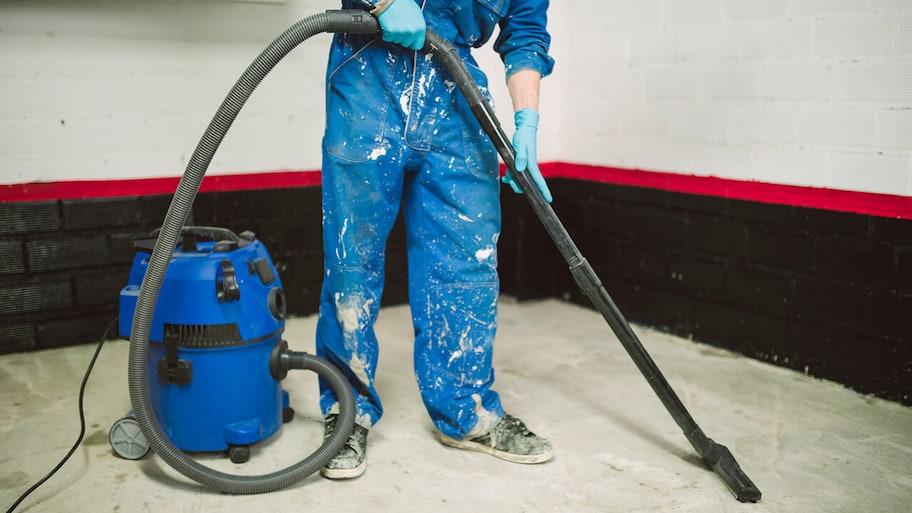 professional cleaning up a construction site