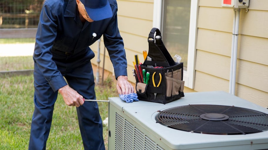 Technician services outside AC units and generator