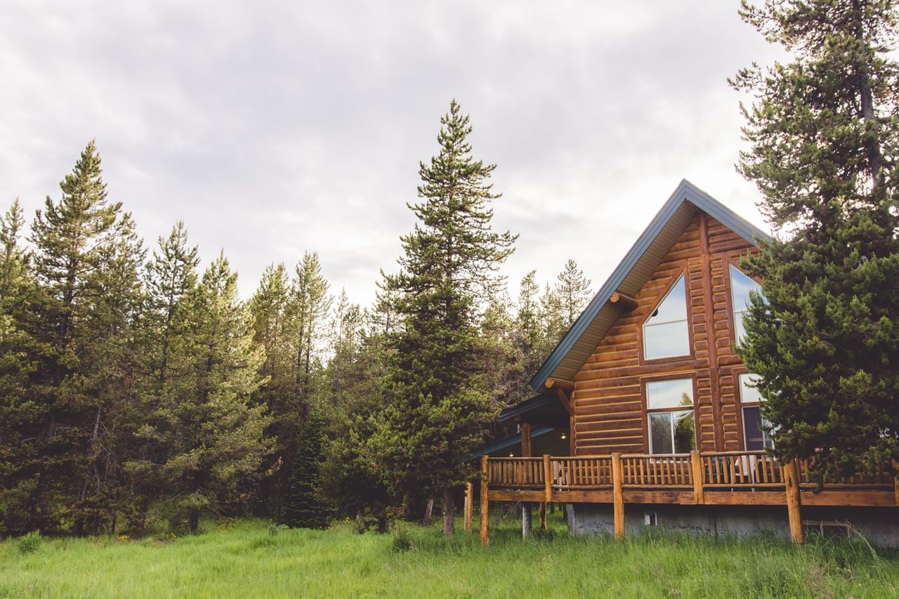 A type A wooden cabin in the woods