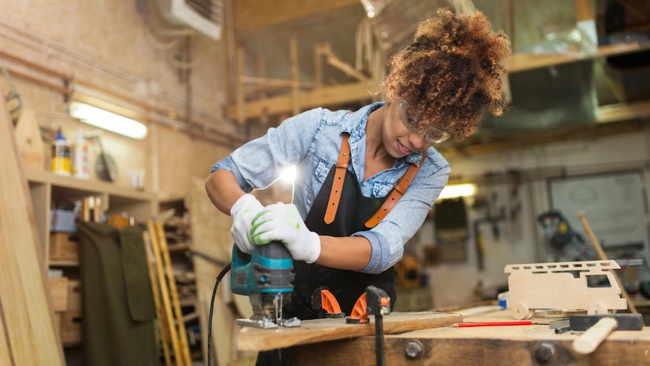 Woman craftswoman working in her workshop